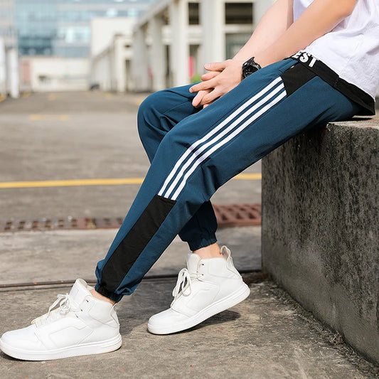 https://ae01.alicdn.com/kf/S3eb6cef80b1a4eea96fb61b4dbeb1355D/New-Men-s-Autumn-and-Winter-Casual-Color-Matching-Trousers-Korean-Style-Clothes-Fashionable-Sports-and.jpg