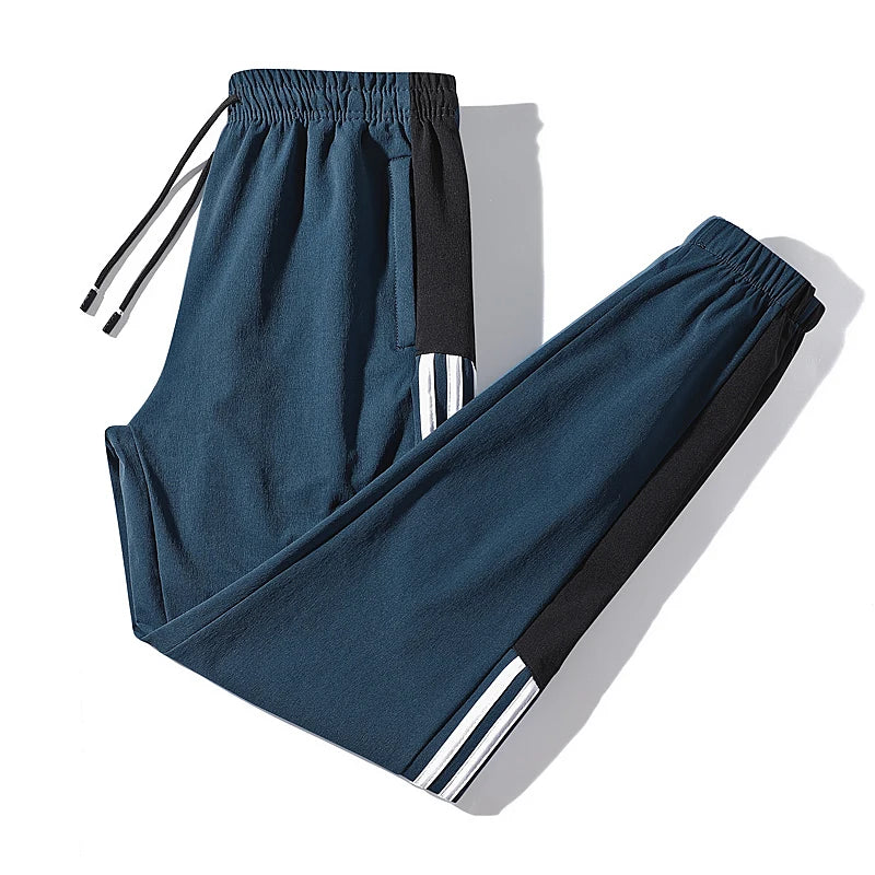 https://ae01.alicdn.com/kf/S11ba93c6d26543938cda9e1b40d78fcbG/New-Men-s-Autumn-and-Winter-Casual-Color-Matching-Trousers-Korean-Style-Clothes-Fashionable-Sports-and.jpg