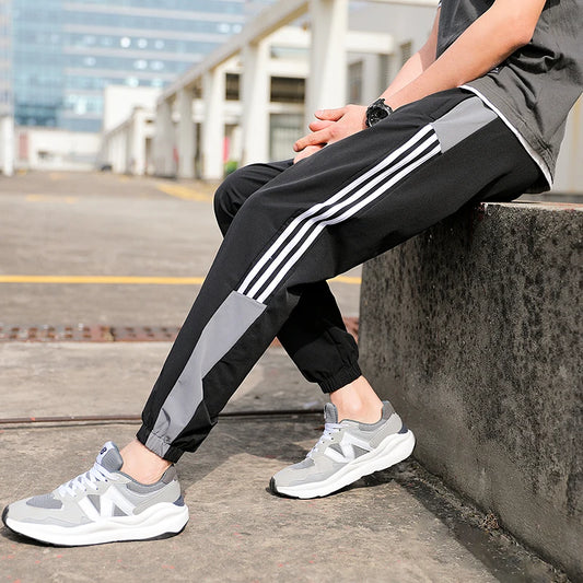 https://ae01.alicdn.com/kf/Sb46160c6359d433194f0341426e72827Q/New-Men-s-Autumn-and-Winter-Casual-Color-Matching-Trousers-Korean-Style-Clothes-Fashionable-Sports-and.jpg